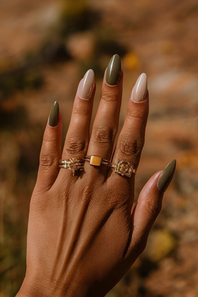 Aura nails featuring a blend of earthy tones like olive green, brown, and beige for a natural autumn design