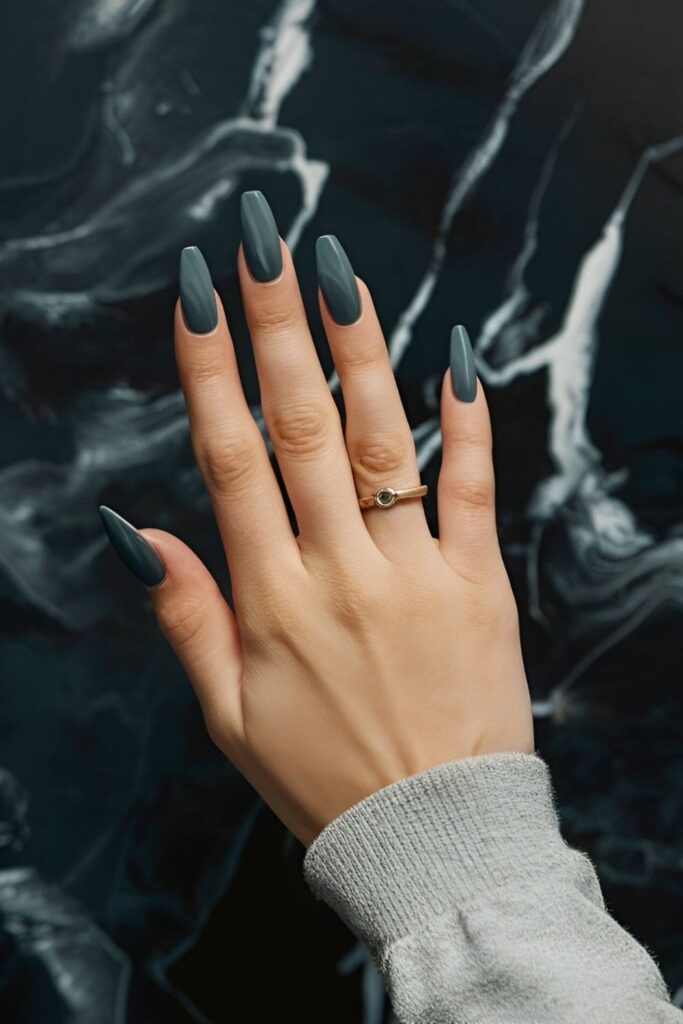 Aura nails in smoky quartz-inspired shades of grey and black, with a touch of silver for elegance