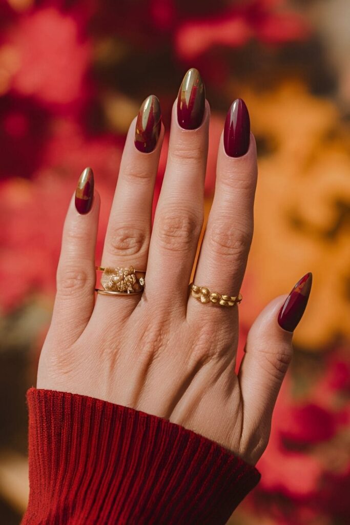 Aura nails with a blend of red, orange, and brown shades, evoking the cozy feel of autumn leaves