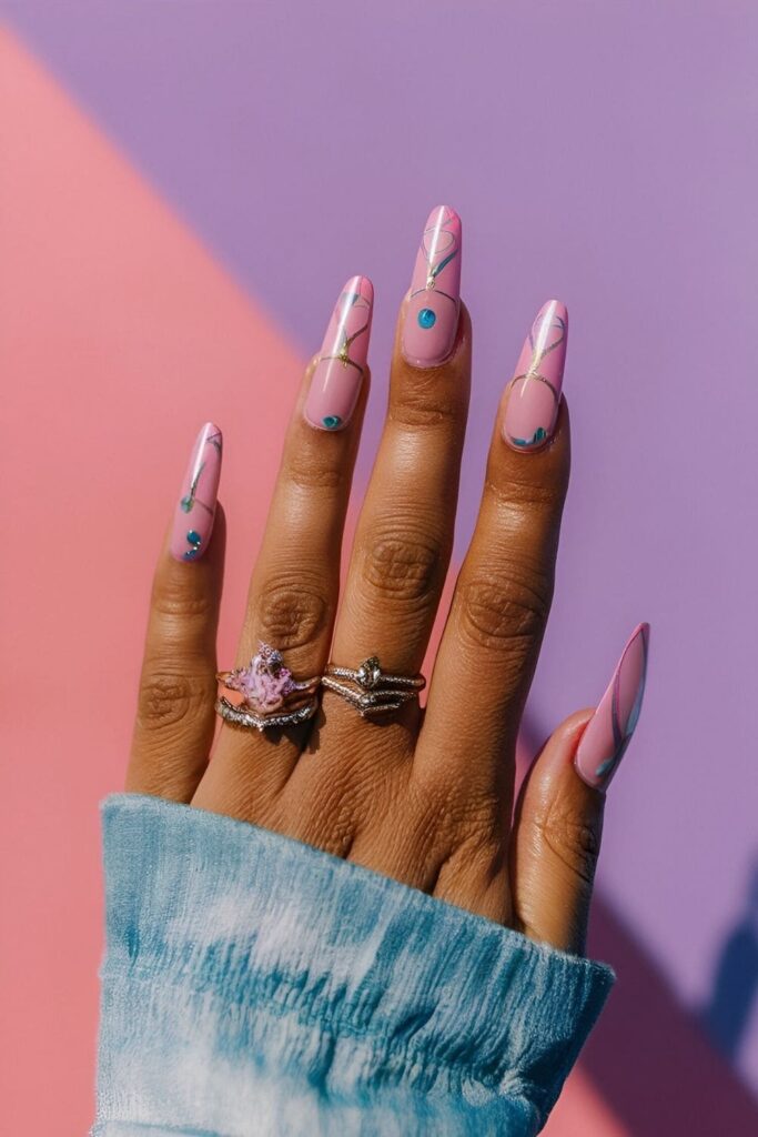 Aura nails with soft pinks, purples, and blues for an enchanting, whimsical design