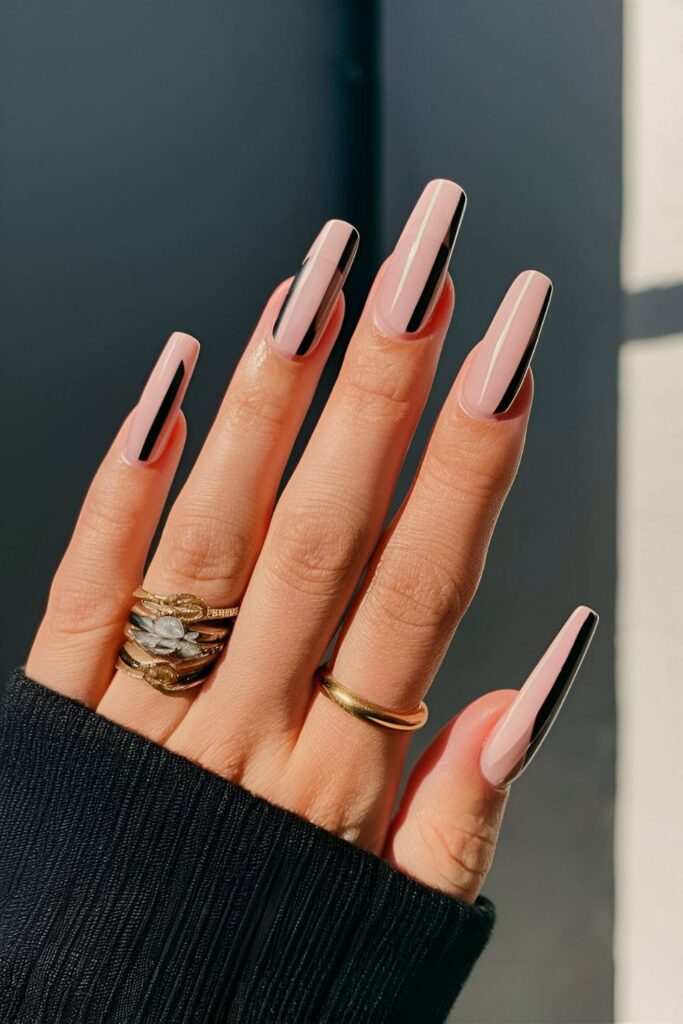 Bold striped nail art in contrasting colors