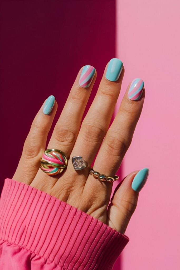 Candy coated nails with pastel stripes and polka dots