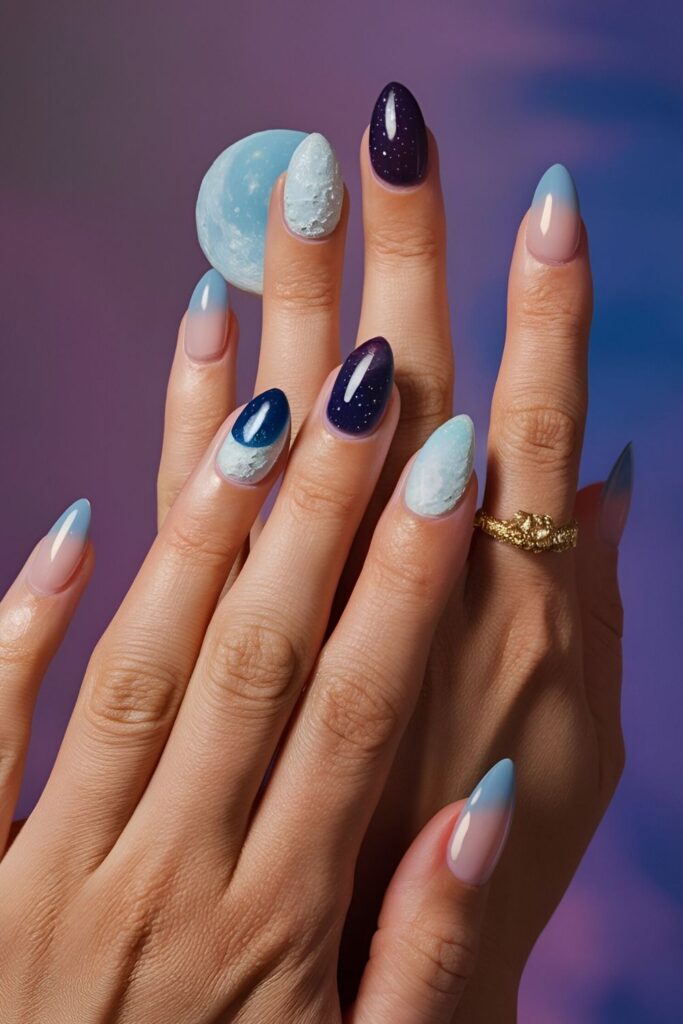 Chic-nails-with-a-light-blue-base-and-dark-blue-half-moon-designs-at-the-cuticle-including-a-full-moon-on-one-nail