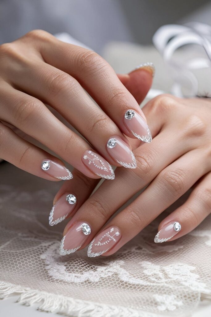 Crystal clear nails with tiny crystal accents for a minimalist look