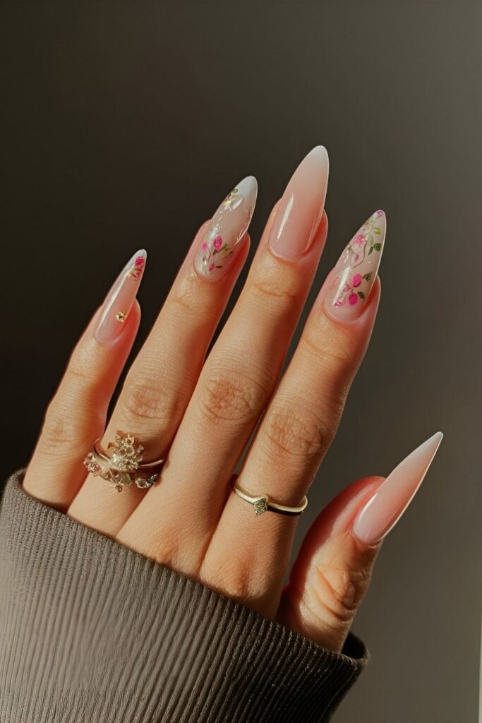 Elegant faded floral nails with delicate, light-painted flowers