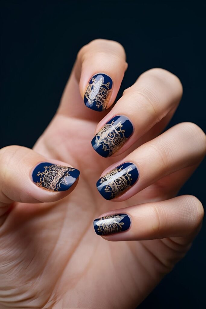 Elegant-nails-with-delicate-lace-patterns-painted-on-a-blue-base-using-intricate-designs