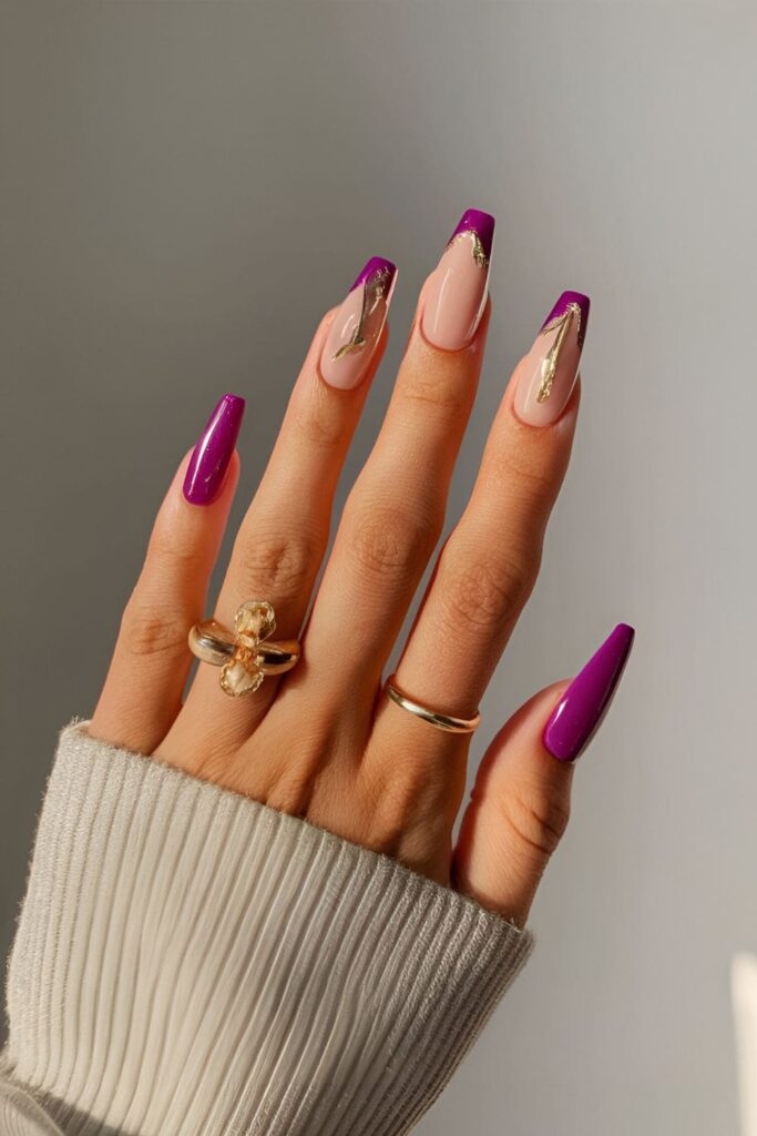 Elegant orchid nails adorned with gold foil accents perfect for a formal event or party