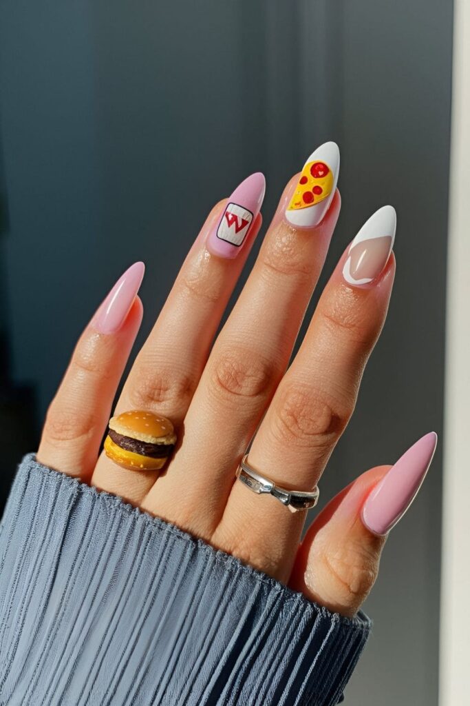 Fun and nostalgic nails inspired by school lunch, painted with tiny pizza slices, burgers, and milk cartons