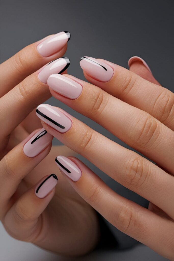 Modern and minimalist orchid nails with clean black or white stripes