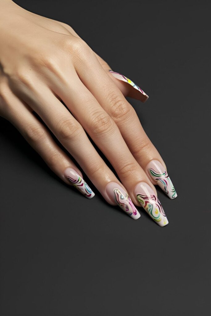 Nail art with colorful swirls and twirls