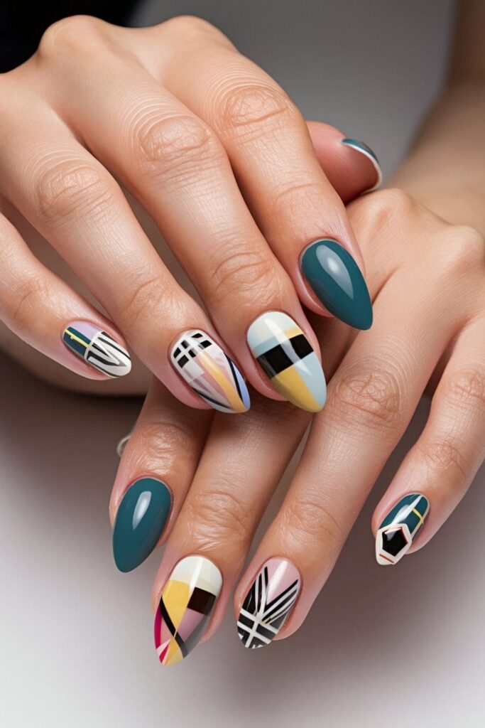 Nails featuring geometric patterns with bold and neutral colors