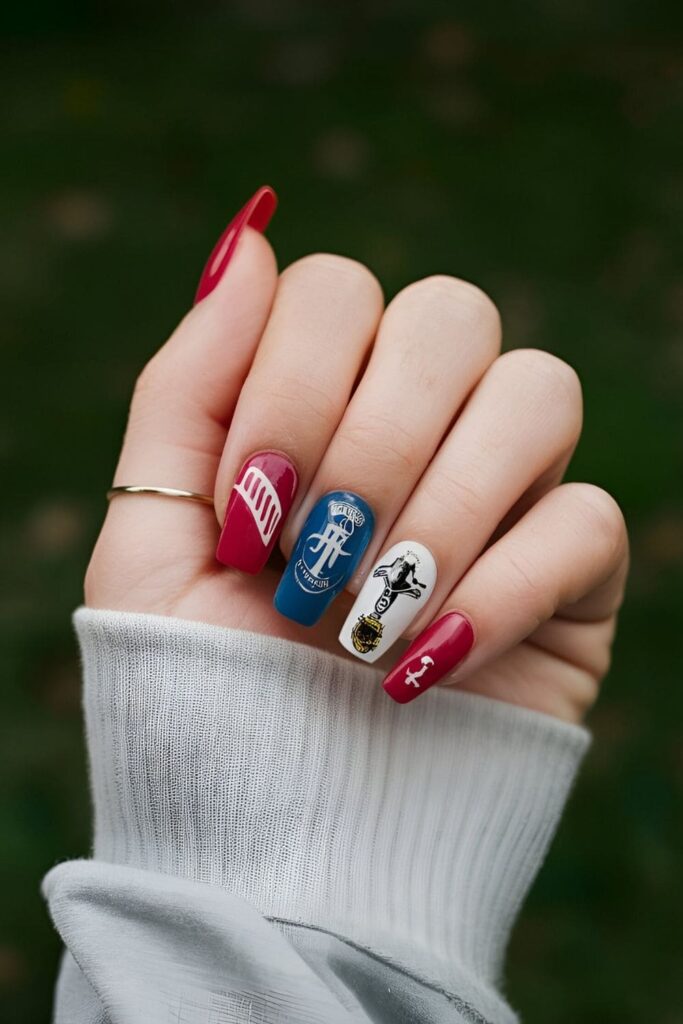 Nails painted in school sports team colors with tiny logos or symbols to show support and personalization