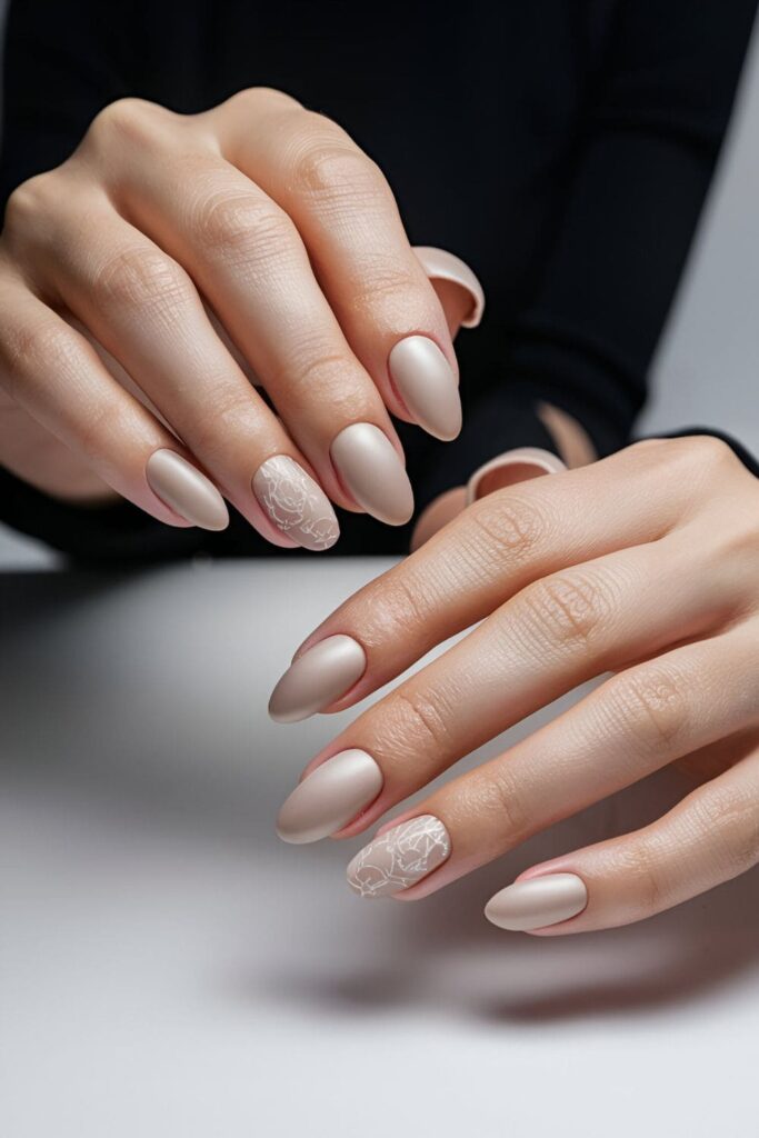 Nails with a soft, luxurious satin finish that is less glossy than traditional polish but more polished than matte