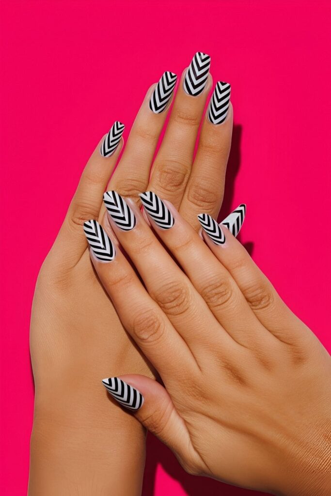 Nails with bold tribal arrow patterns