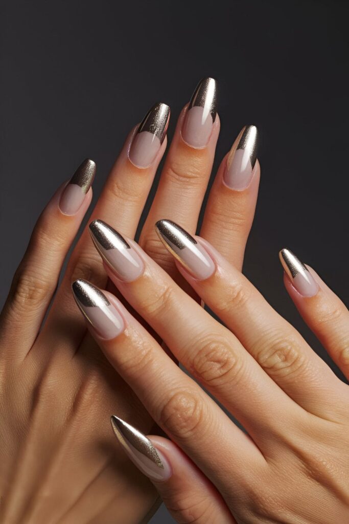 Nails with metallic gold or silver French tips, providing a modern and glamorous update to the classic look