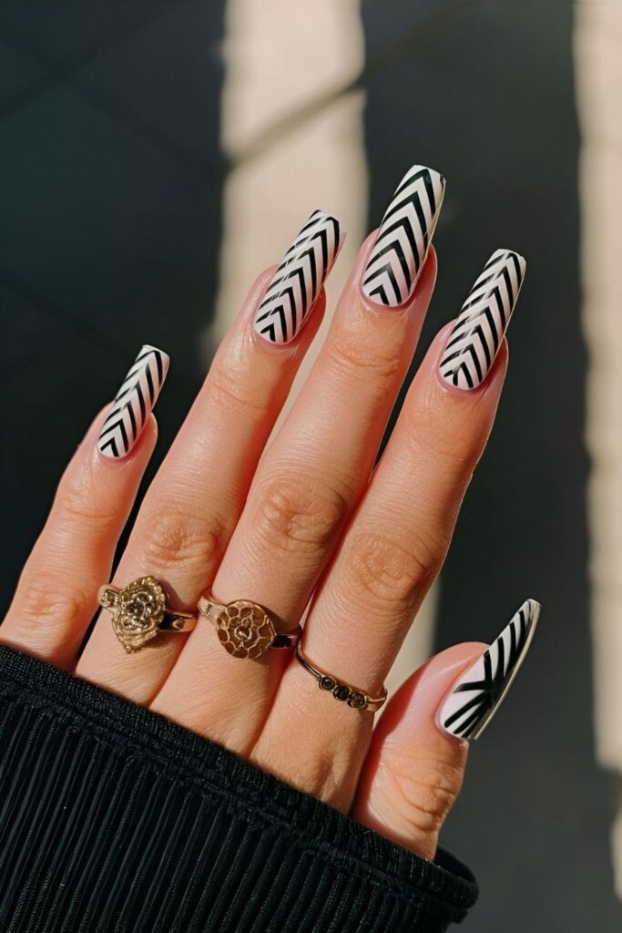 Optical illusion nail art with black and white patterns