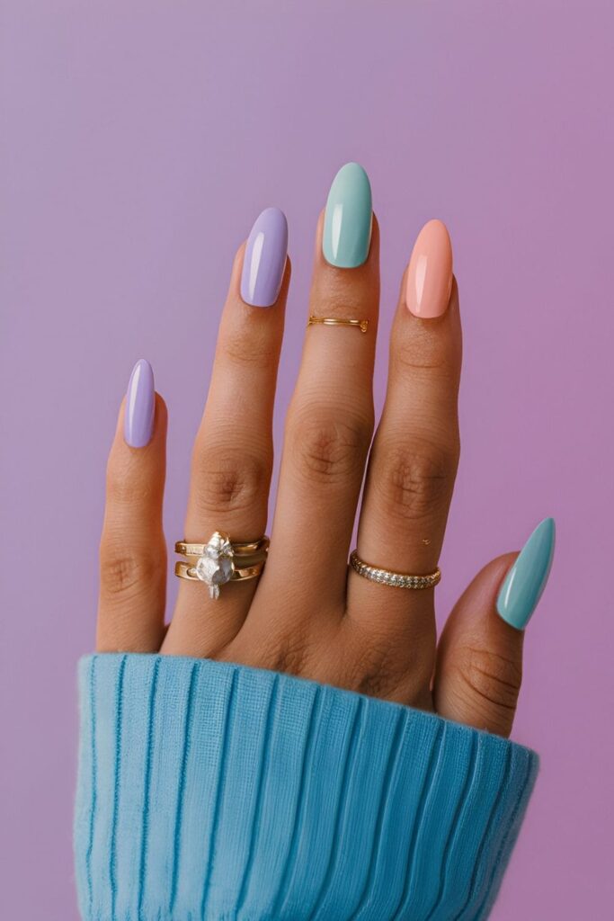 Pastel paradise nails in soft lavender, mint, and peach colors