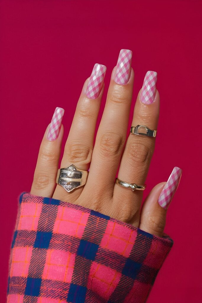 Pink coffin nails with a cozy plaid pattern in varying shades of pink