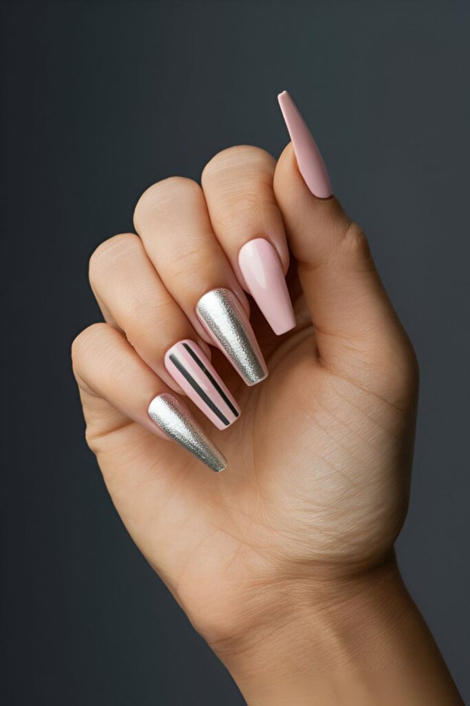 Pink coffin nails with modern metallic accents in silver and gold