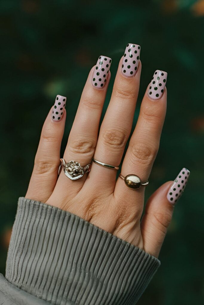 Polka dot frenzy nails with varying sizes and colors of dots