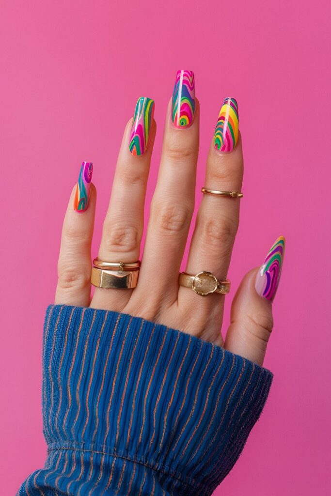 Psychedelic swirl nails with bright, colorful patterns