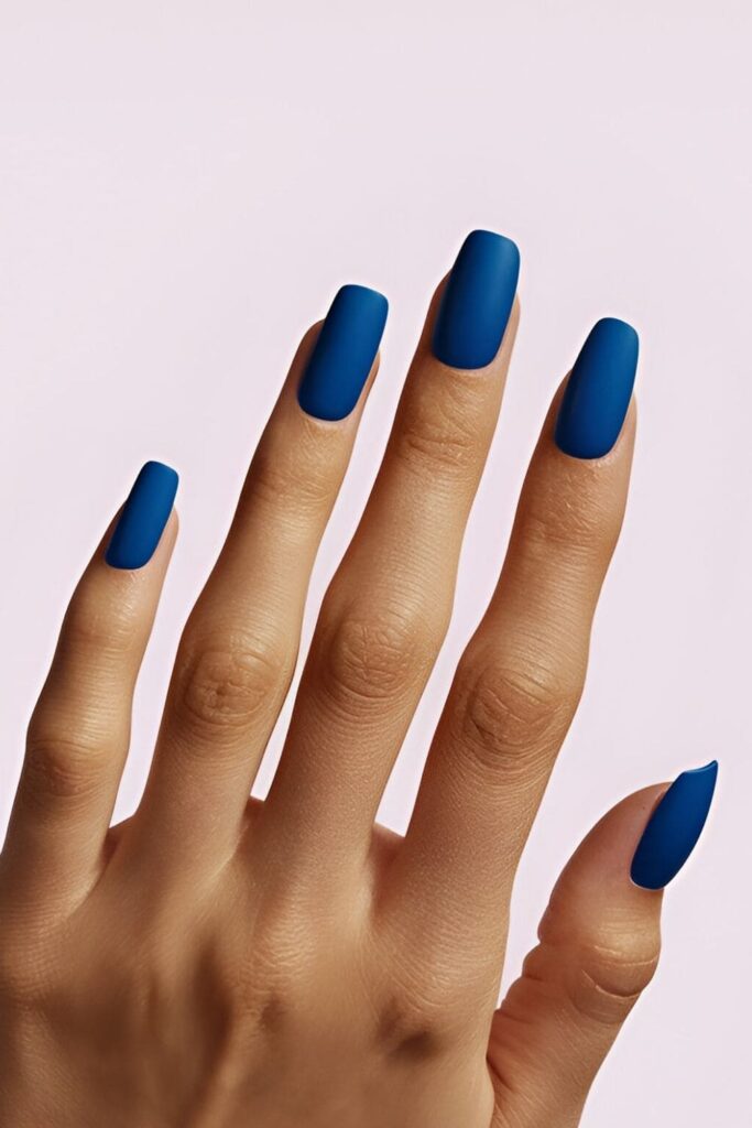 Royal blue nails with a matte finish, offering a chic and modern look with a sophisticated, understated matte texture