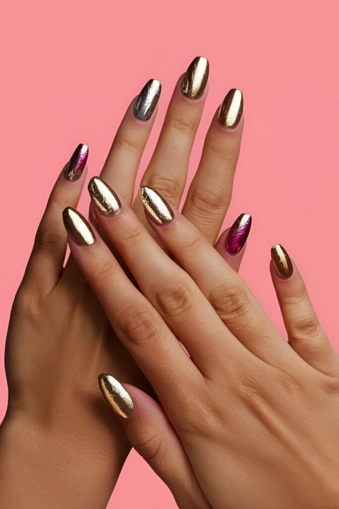 Short acrylic nails with luxurious foil accents in gold, silver, or vibrant colors, textured and shiny