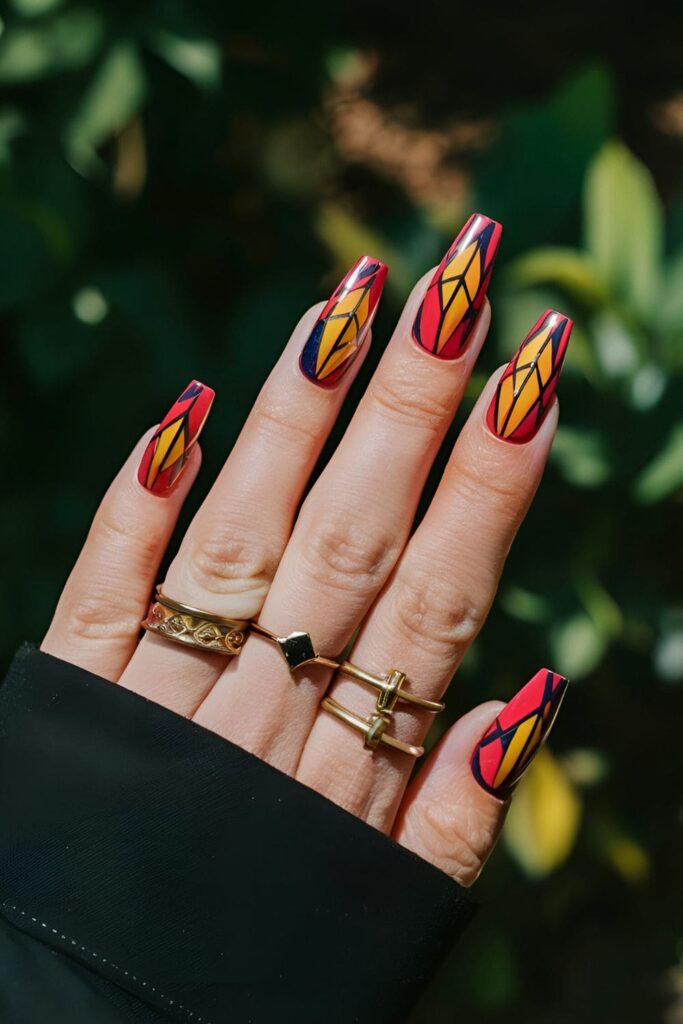 Stained glass-inspired nail art in bold colors