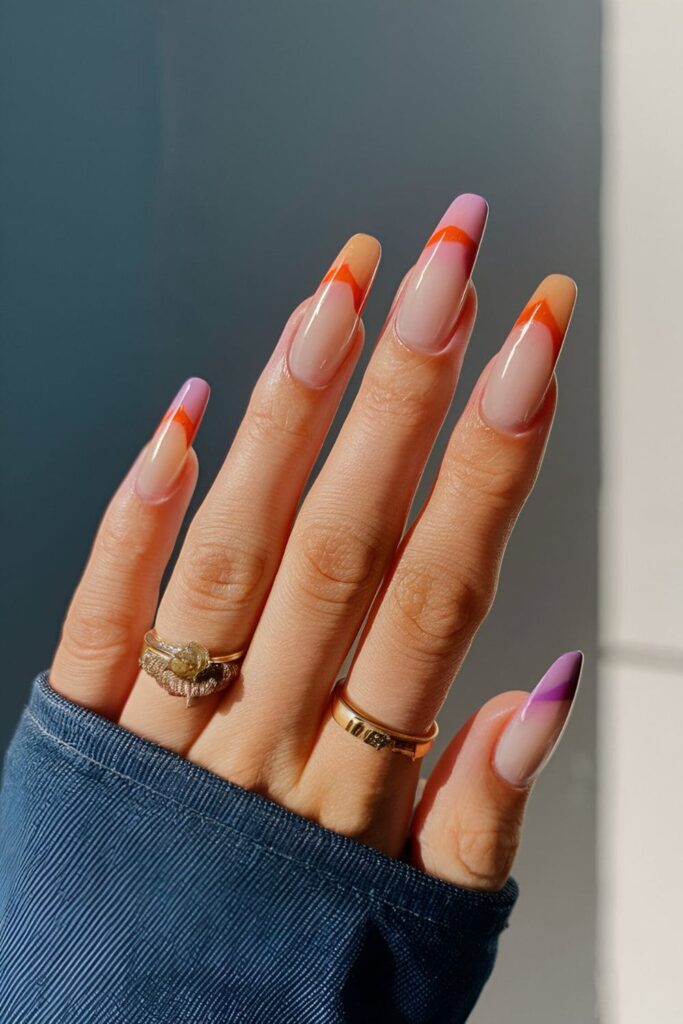 Sunset-inspired gradient nail art in warm hues