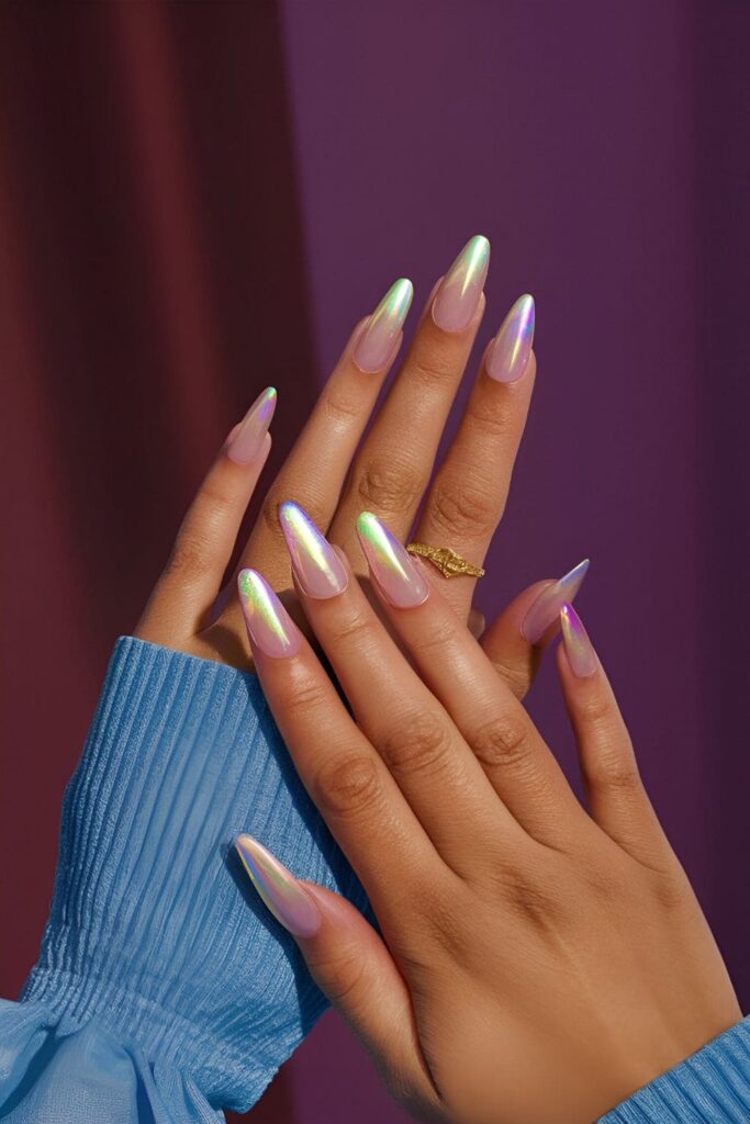 Translucent nails with subtle pink, blue, and green hints, featuring an iridescent finish that catches the light