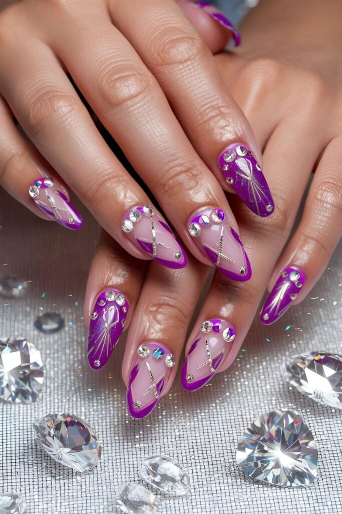 Acrylic nails adorned with small crystals forming elegant patterns or accents