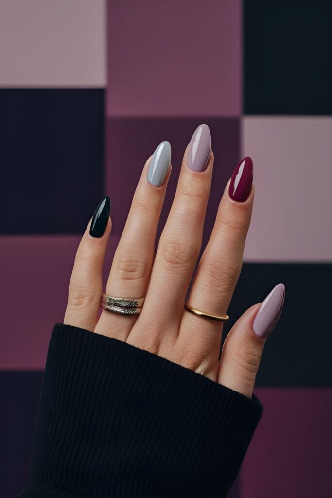 Monochromatic acrylic nails in a single color with different shades and finishes